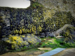 Lichen covered stone wall in Cornwall England