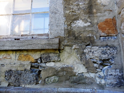 old stone wall of building